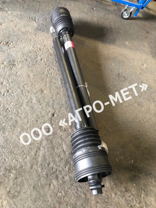 Вал карданный 6-ой серии, с широкоугольным шарниром с обгонно-фрикционной муфтой (правая), защитным кожухом, 710Нм, крестовина 30,2х92