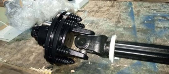 Карданный вал 6-ой серии с защитным кожухом 710Нм с обгонно-фрикционной муфтой, крестовина 30,2х92